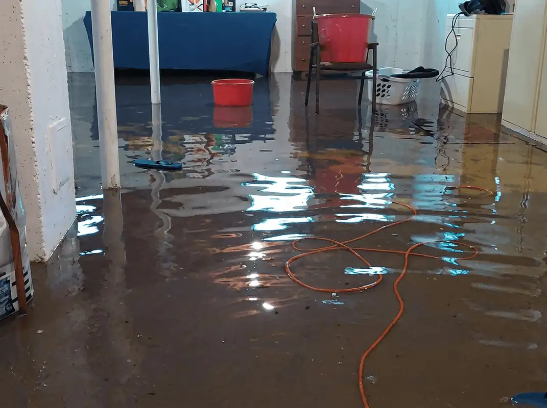 Basement with boiler, cabinets and washing machine completely flooded in Cedar Rapids, IA
