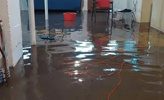 Basement with boiler, cabinets and washing machine completely flooded in Cedar Rapids, IA
