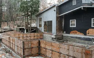 Prepared site with foundation forms for home remodeling and addition project in Cedar Rapids, IA